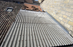 Rénovation de toiture de fibre en ciment